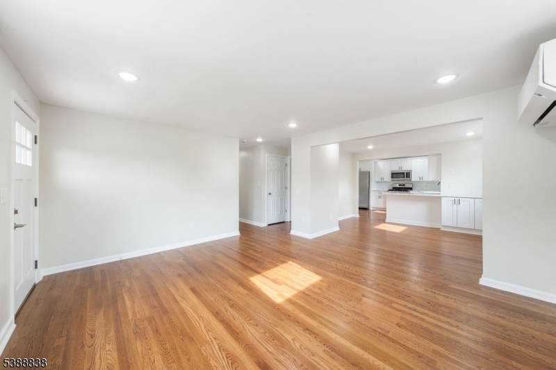 2429 Vauxhall Road Union, NJ 07083 - Photo 6 of 24 a view of empty room with wooden floor