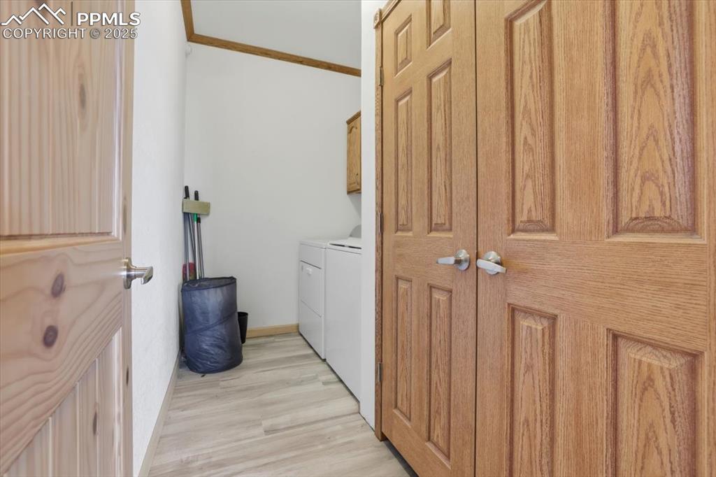 204 Crooked Creek Road Fairplay, CO 80440 - Photo 25 of 50 a view of a hallway with wooden floor