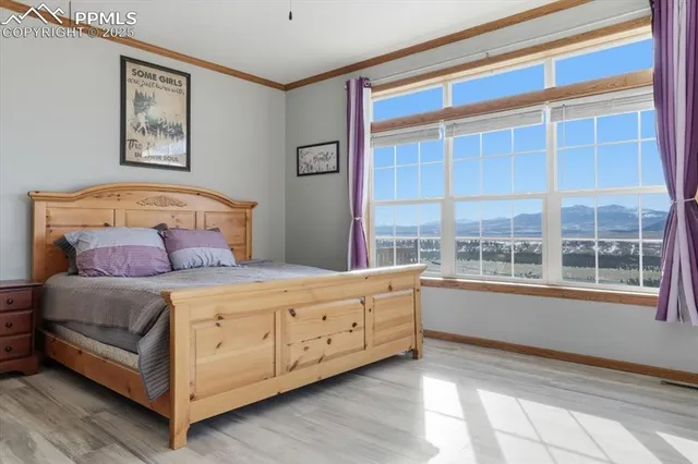 a bathroom with a granite countertop double vanity sink a mirror and