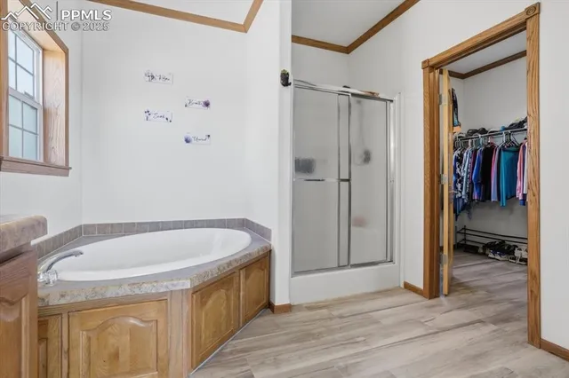 a view of a room with wooden shelves