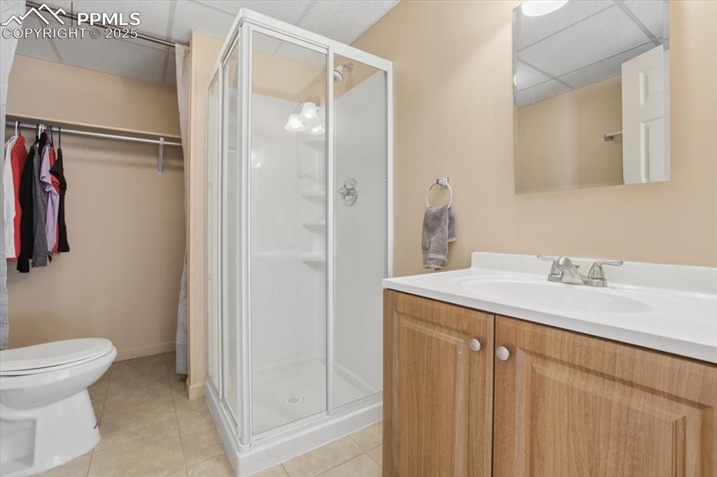 204 Crooked Creek Road Fairplay, CO 80440 - Photo 41 of 50 a bathroom with a granite countertop sink toilet and shower
