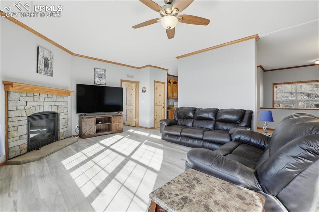204 Crooked Creek Road Fairplay, CO 80440 - Photo 9 of 50 a living room with furniture and a flat screen tv