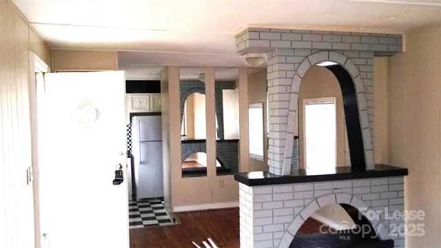 a view of living room with a large window