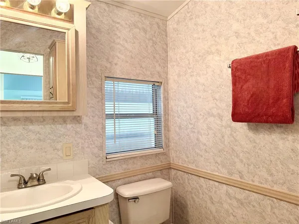 a bathroom with a sink and a toilet