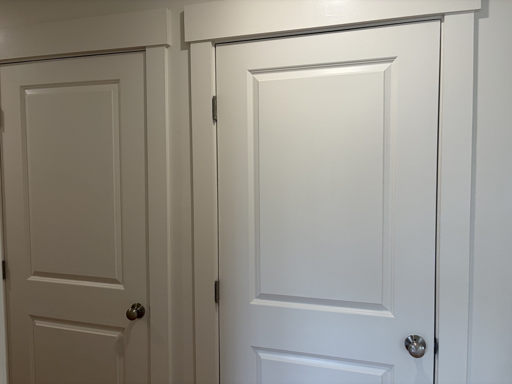 76 Valmor Street Worcester, MA 01604 - Photo 11 of 20 a bathroom with a glass shower door