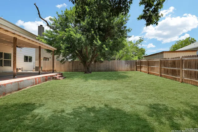 a view of swimming pool with outdoor seating