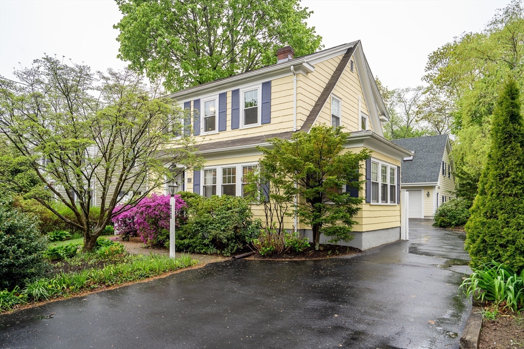 447 Waltham Street Lexington, MA 02421 - Photo 1 of 1 a front view of house with yard and green space