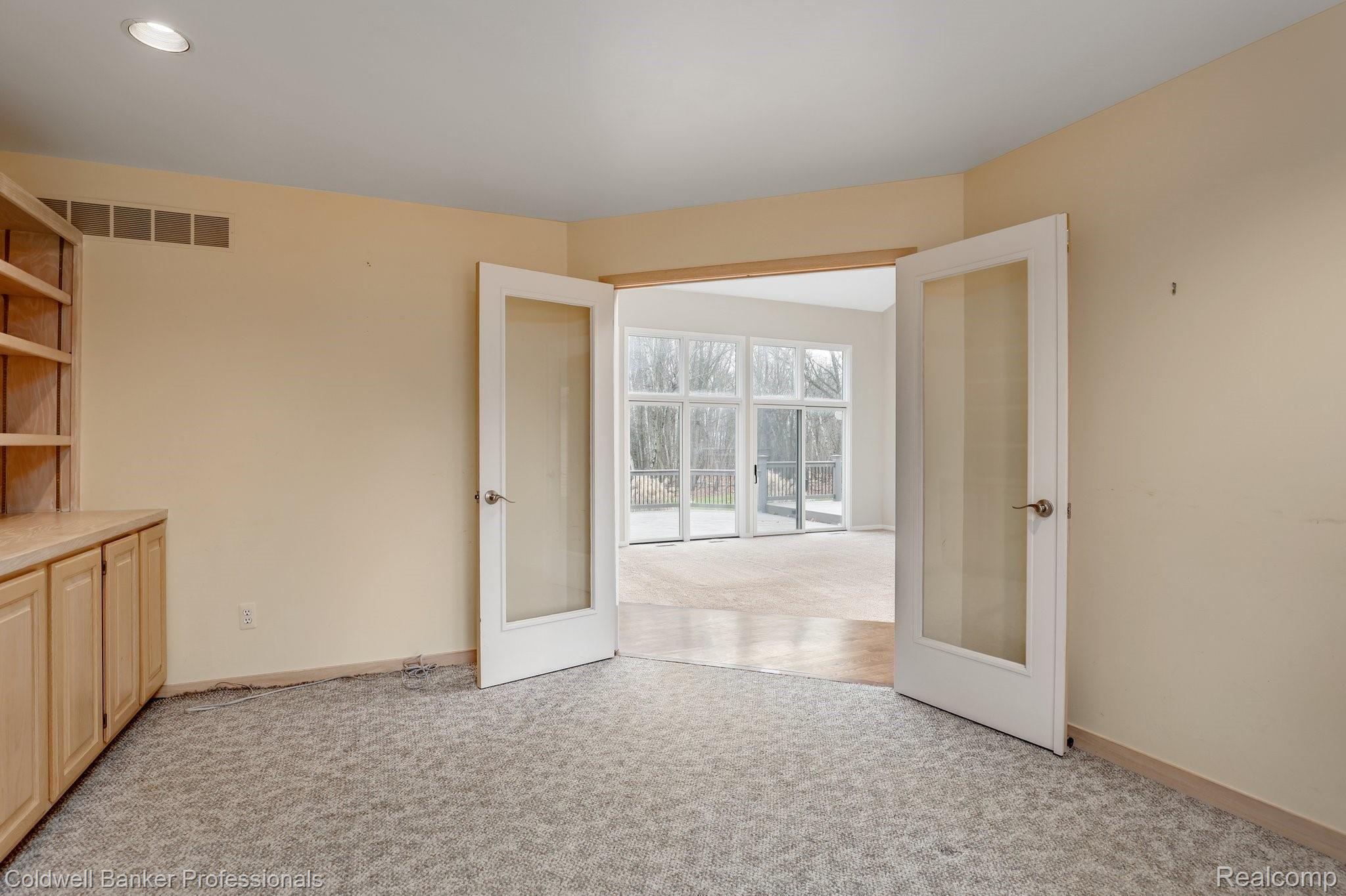 5365 Ridge Trail North Clarkston, MI 48348 - Photo 17 of 55 Private library/study with french doors