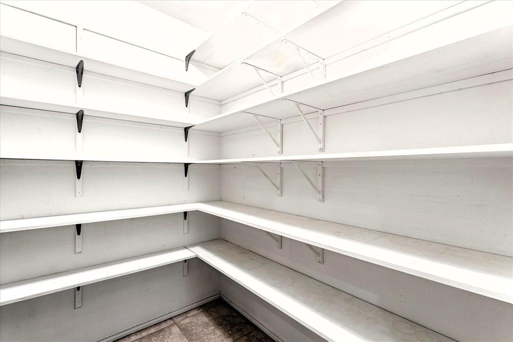 4940 North Frontage Road Winfield, TX 75455 - Photo 25 of 40 Oh My! This Closet is a Perfect Fit for Shoe Lovers!