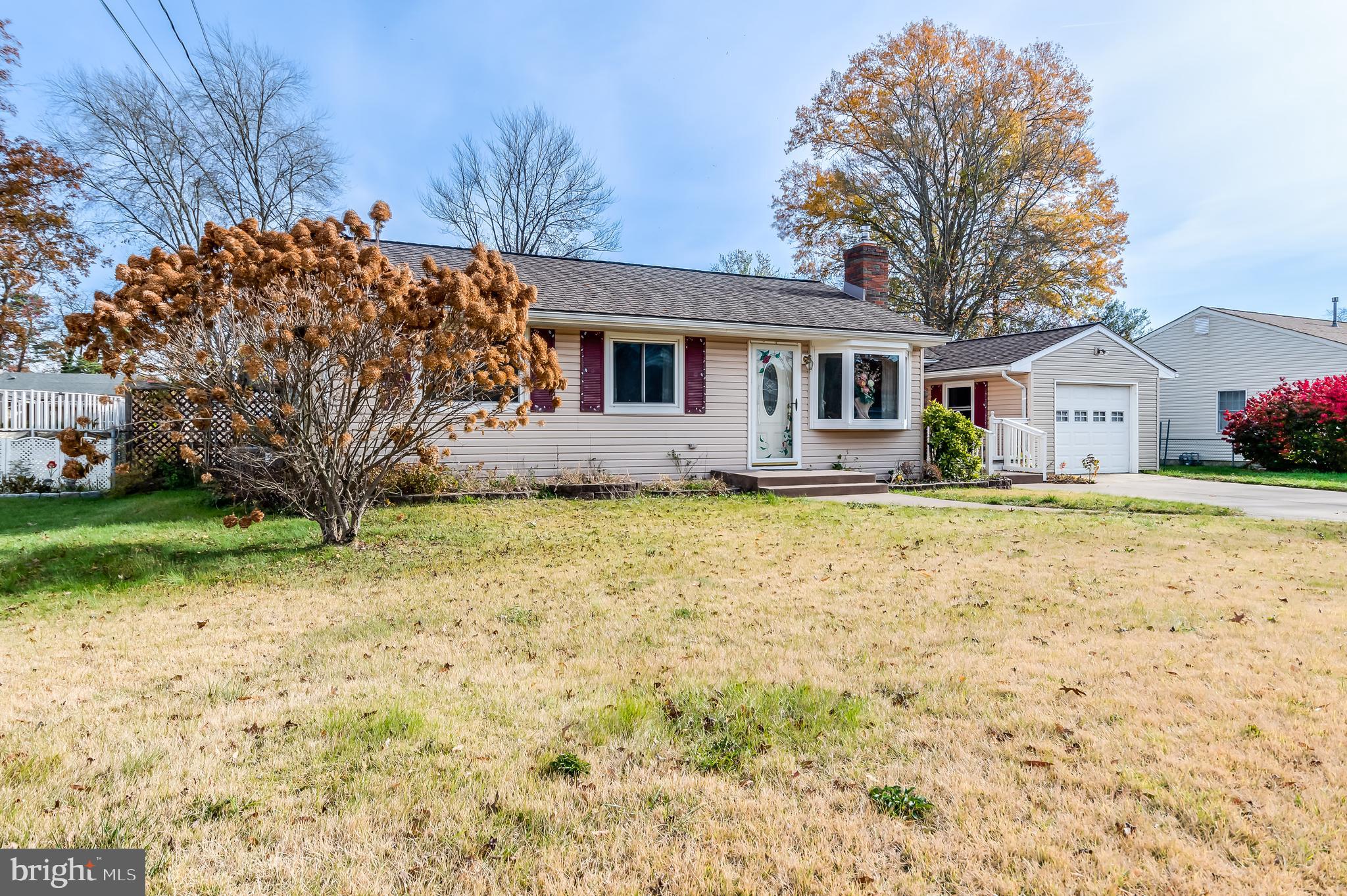 13 Stagecoach Road Southampton, NJ 08088 - Photo 1 of 42 a front view of house with yard and trees around