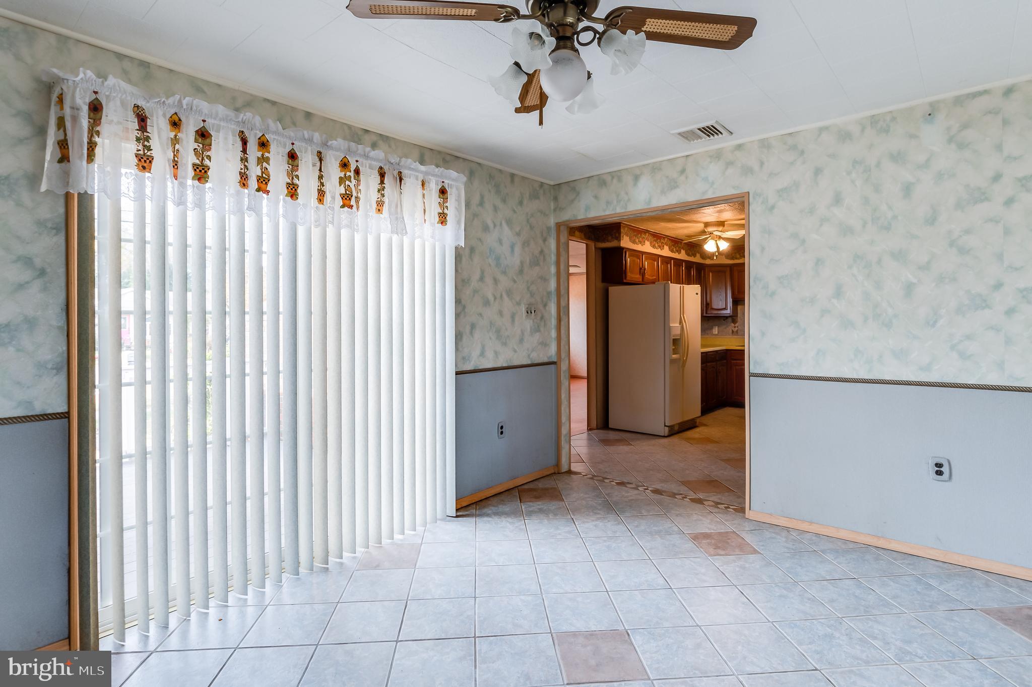13 Stagecoach Road Southampton, NJ 08088 - Photo 11 of 42 a view of a livingroom with a staircase