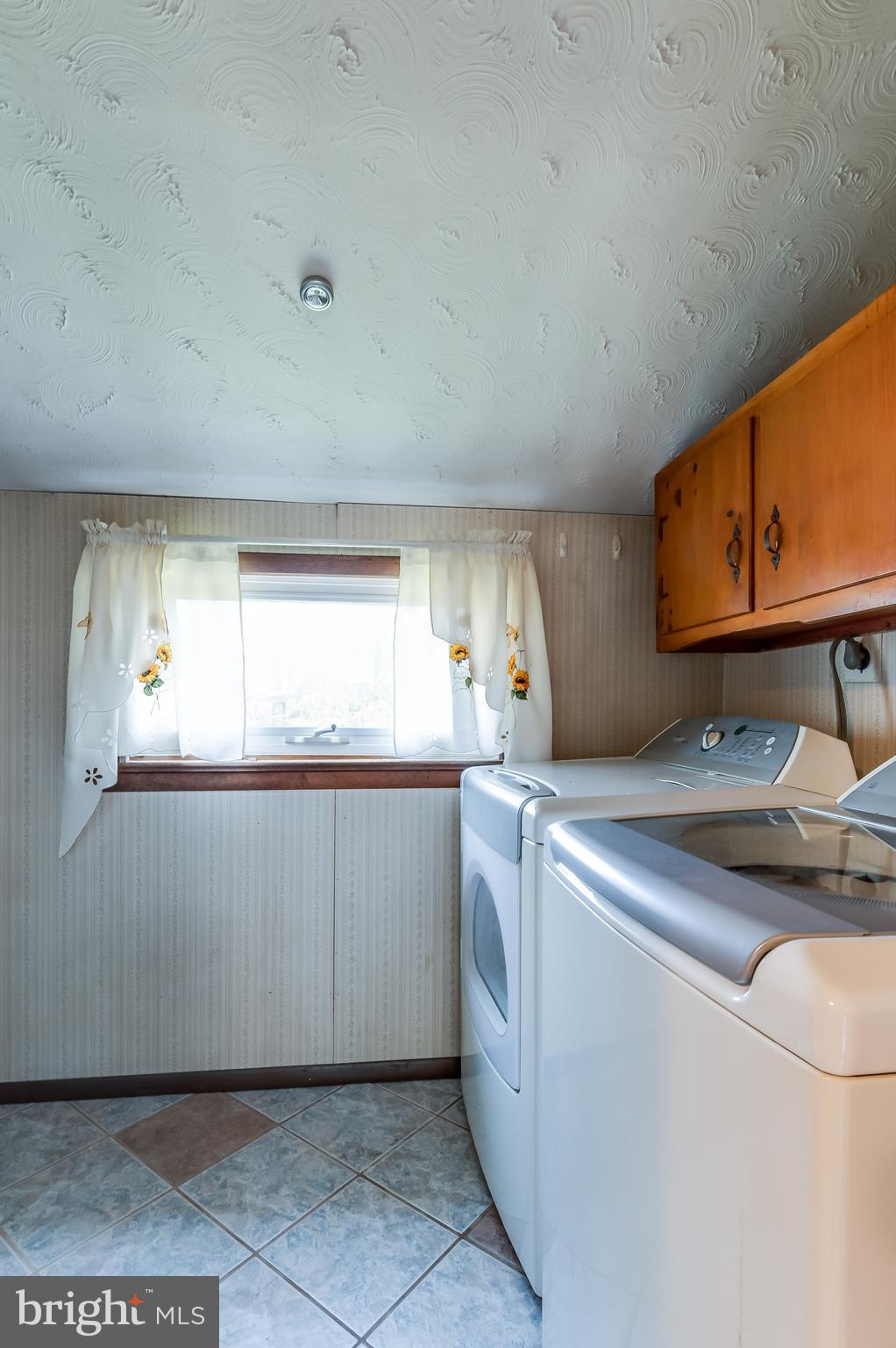 13 Stagecoach Road Southampton, NJ 08088 - Photo 13 of 42 a kitchen with a sink cabinets and a window
