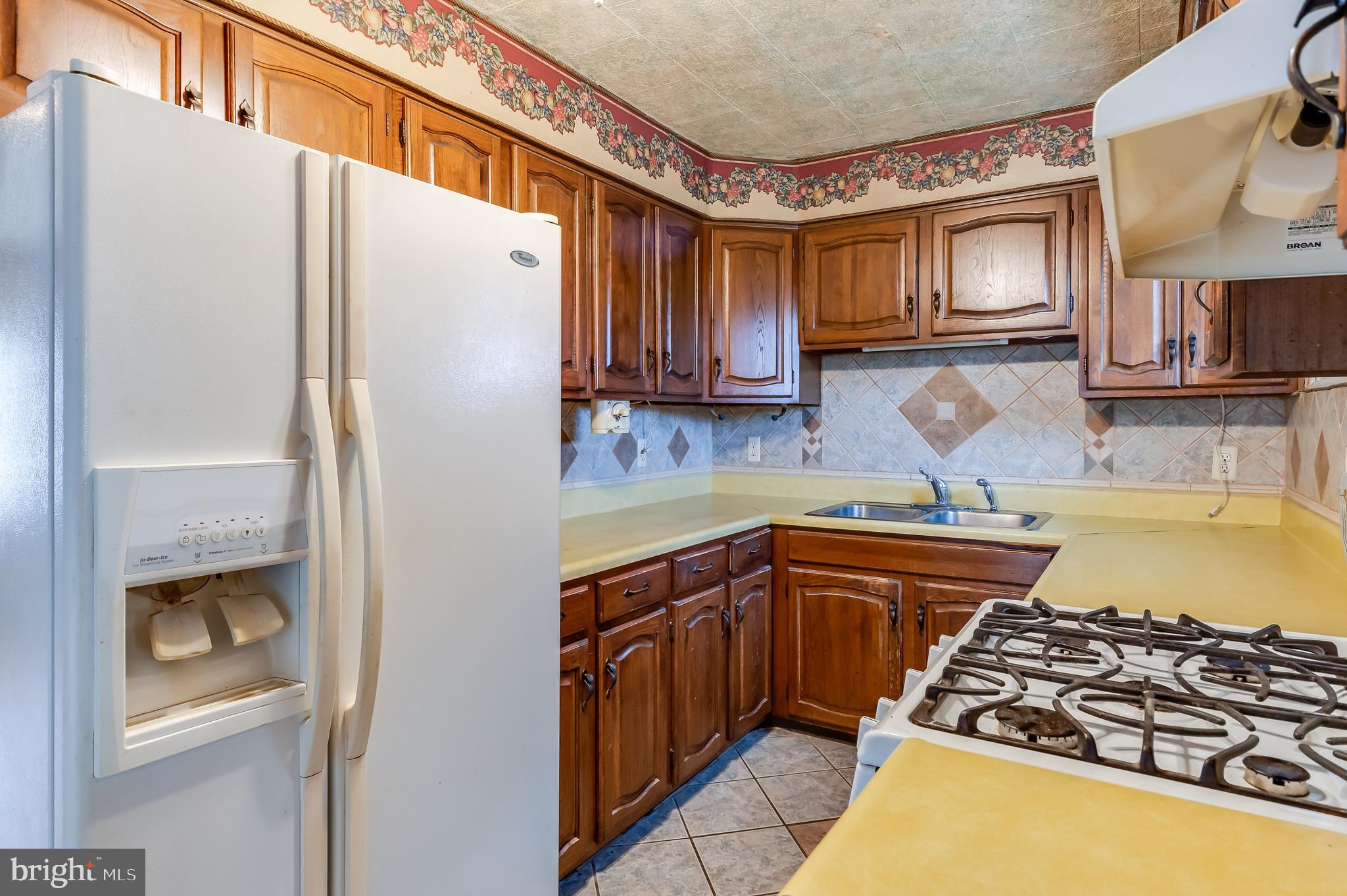 13 Stagecoach Road Southampton, NJ 08088 - Photo 14 of 42 a kitchen with stainless steel appliances granite countertop a refrigerator and a sink