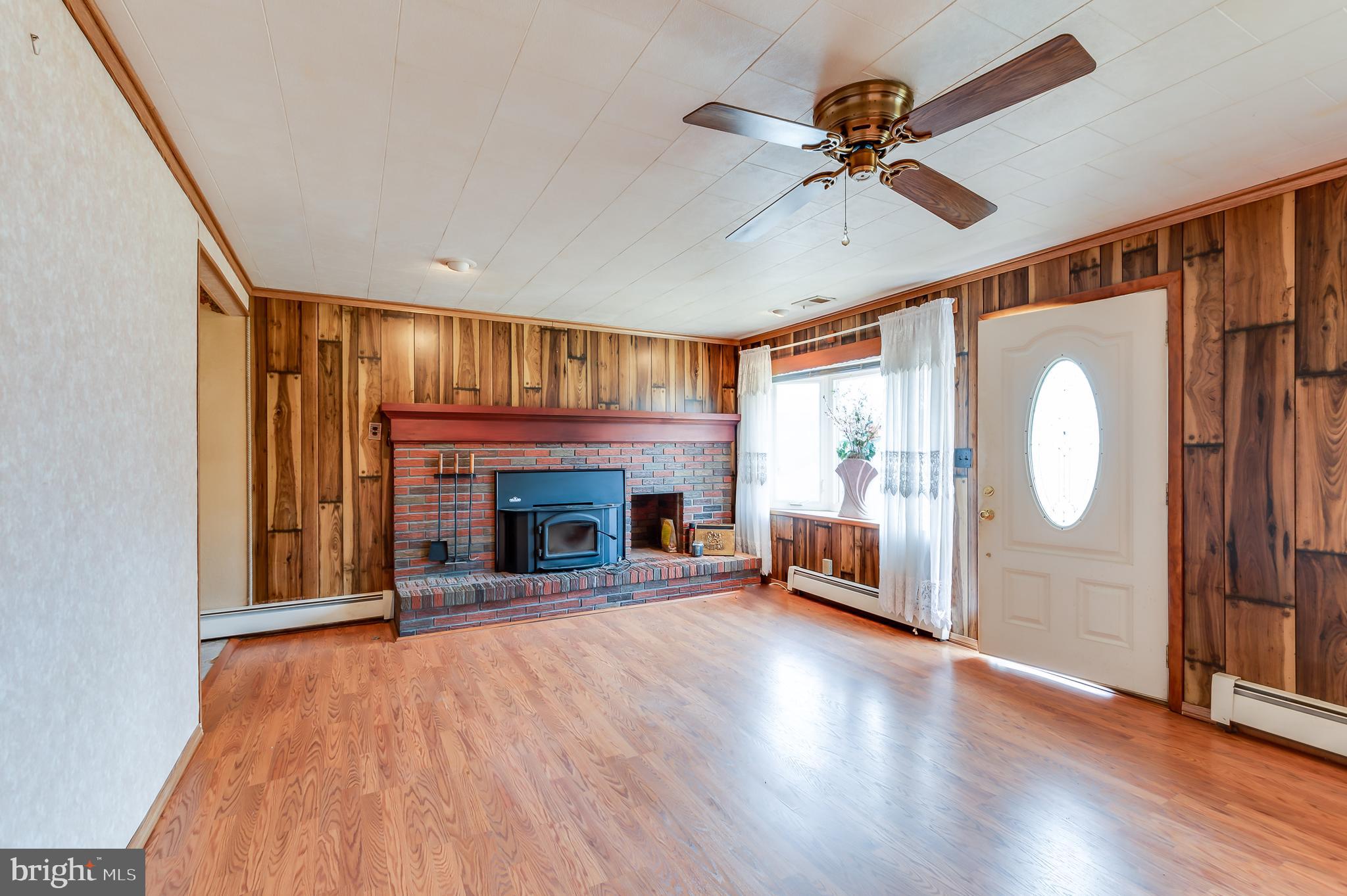 13 Stagecoach Road Southampton, NJ 08088 - Photo 6 of 42 a living room with furniture and a fireplace