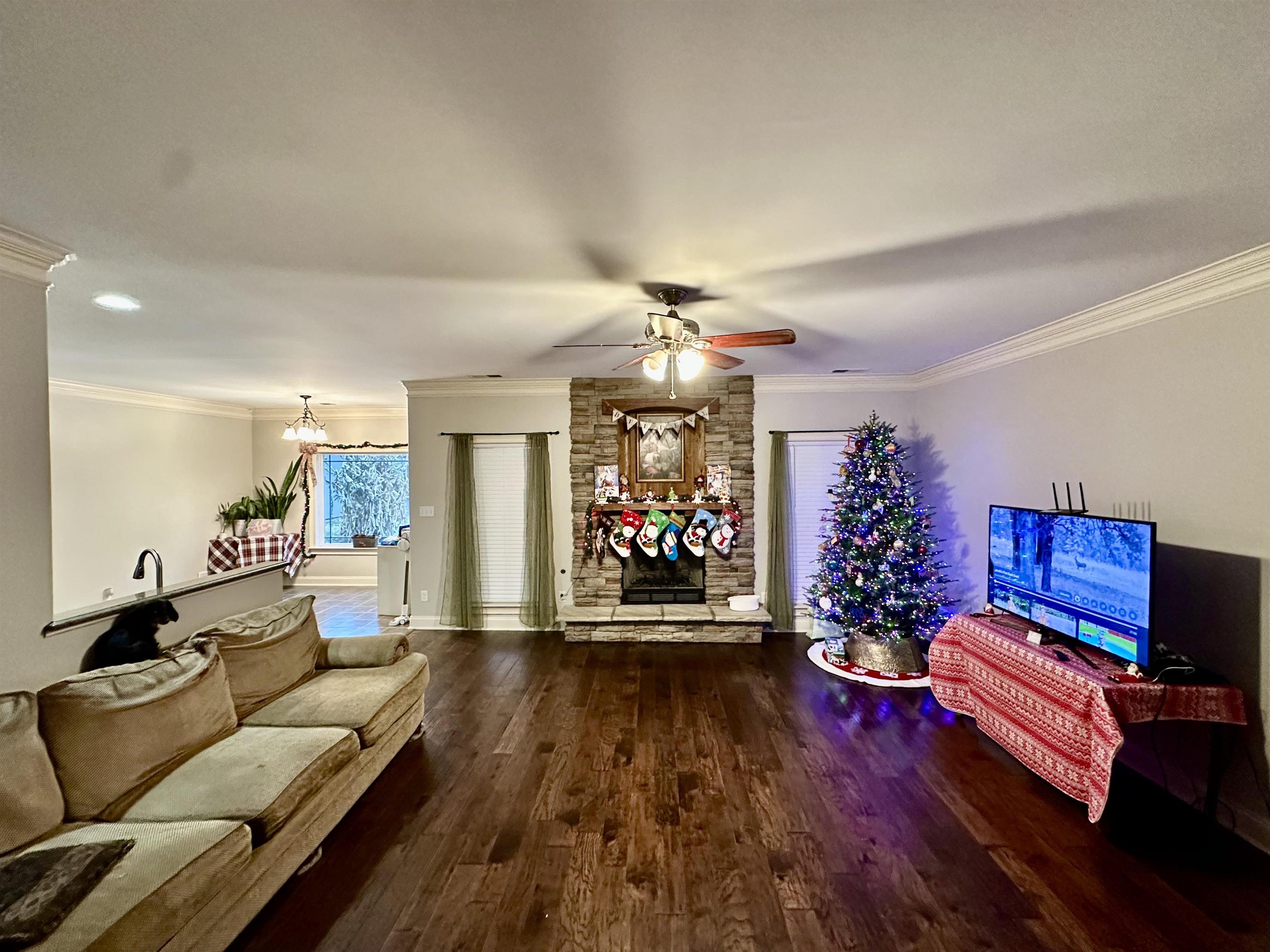 516 Egypt Road Munford, TN 38058 - Photo 15 of 40 a living room with furniture and wooden floor