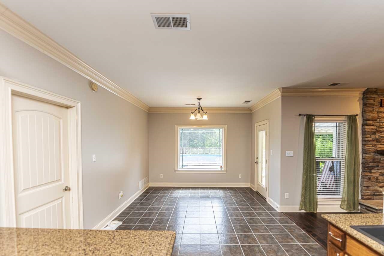 516 Egypt Road Munford, TN 38058 - Photo 17 of 40 a view of a hallway with windows and chandelier