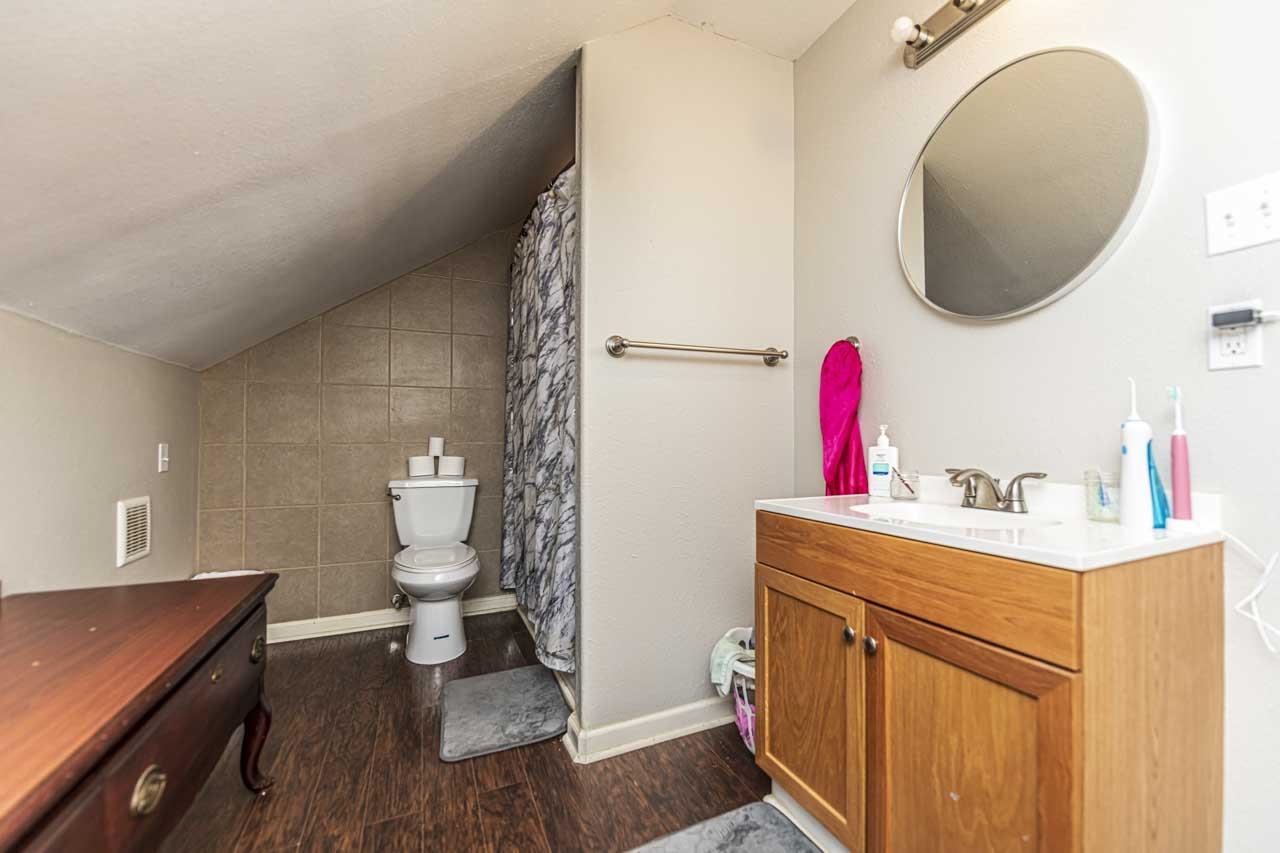 516 Egypt Road Munford, TN 38058 - Photo 28 of 40 a bathroom with a sink and a mirror