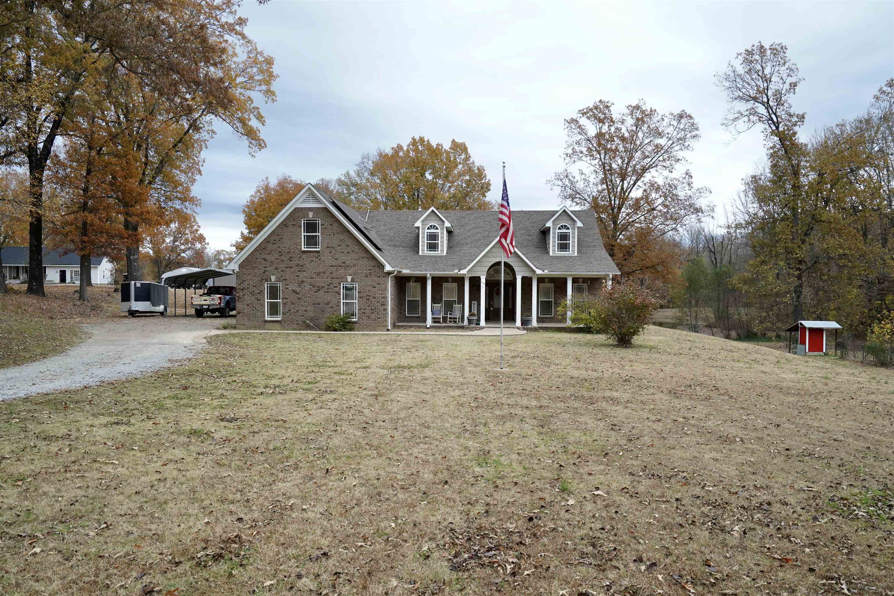 516 Egypt Road Munford, TN 38058 - Photo 34 of 40 a front view of a house with a yard