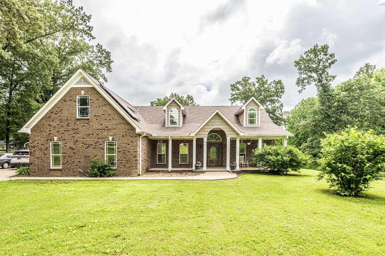 516 Egypt Road Munford, TN 38058 - Photo 6 of 40 a front view of a house with a garden