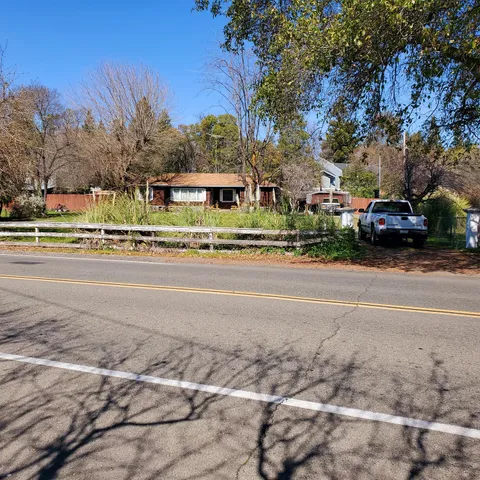 front view of a house with a street view