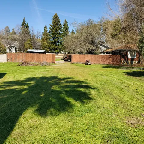 a view of a garden with an outdoor space