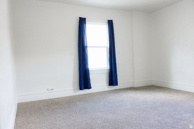 69 South Main Street Manti, UT 84642 - Photo 37 of 44 Neutral wall paint with carpeted flooring and white trim