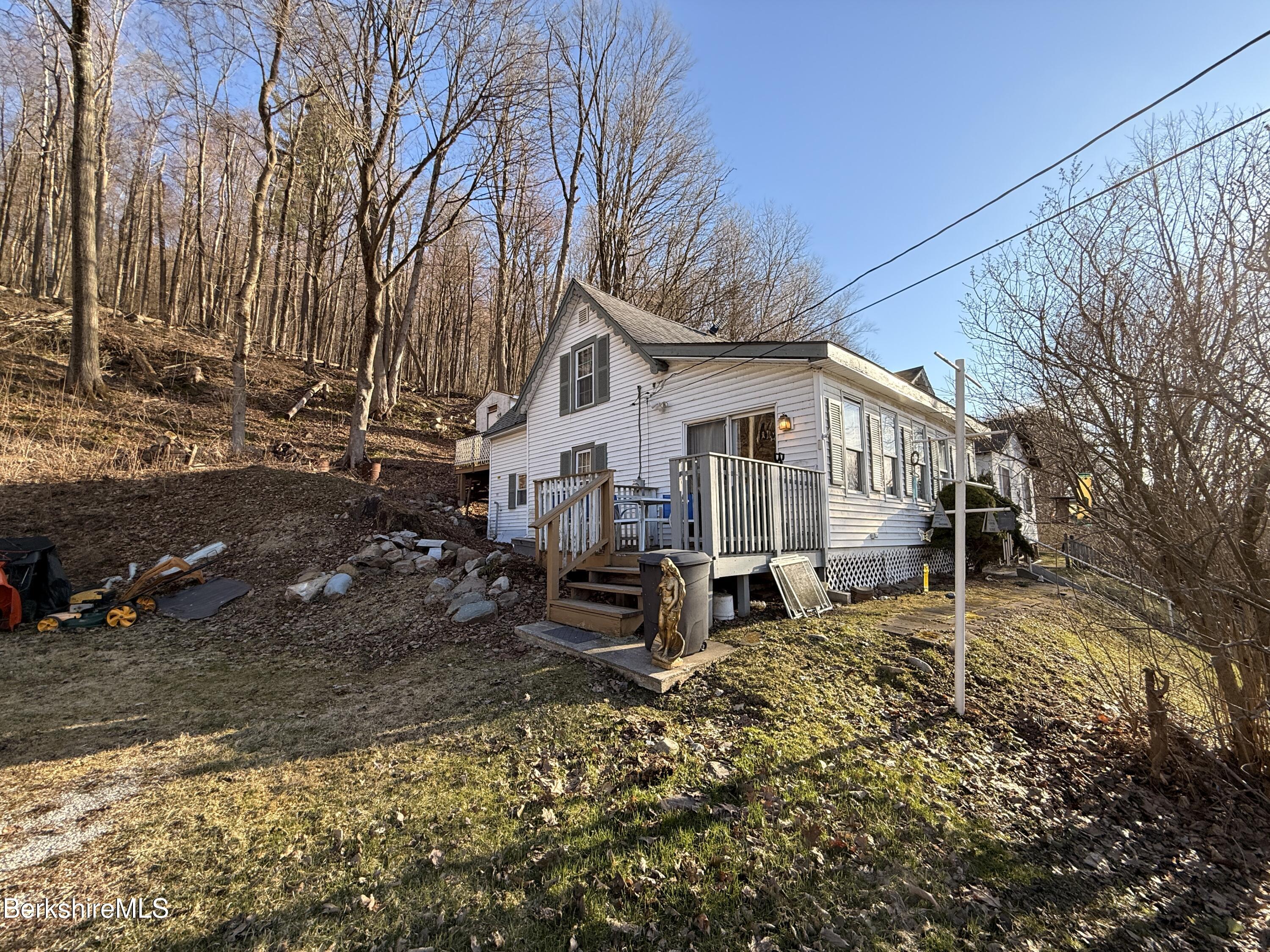 422 West Main Street North Adams, MA 01247 - Photo 4 of 24 a view of a house with a patio