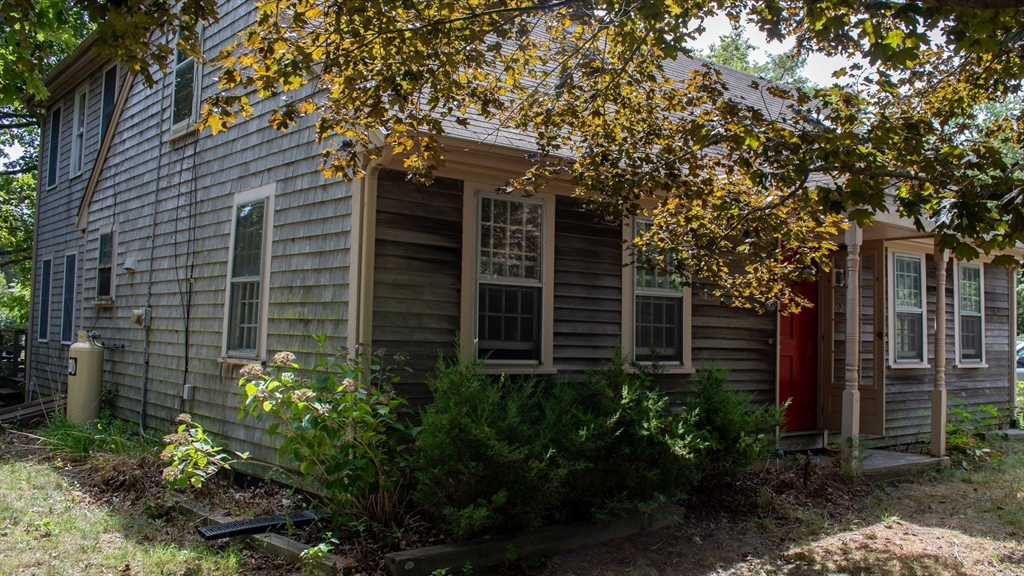 562 North Avenue Rochester, MA 02770 - Photo 2 of 32 a view of a pathway of the house