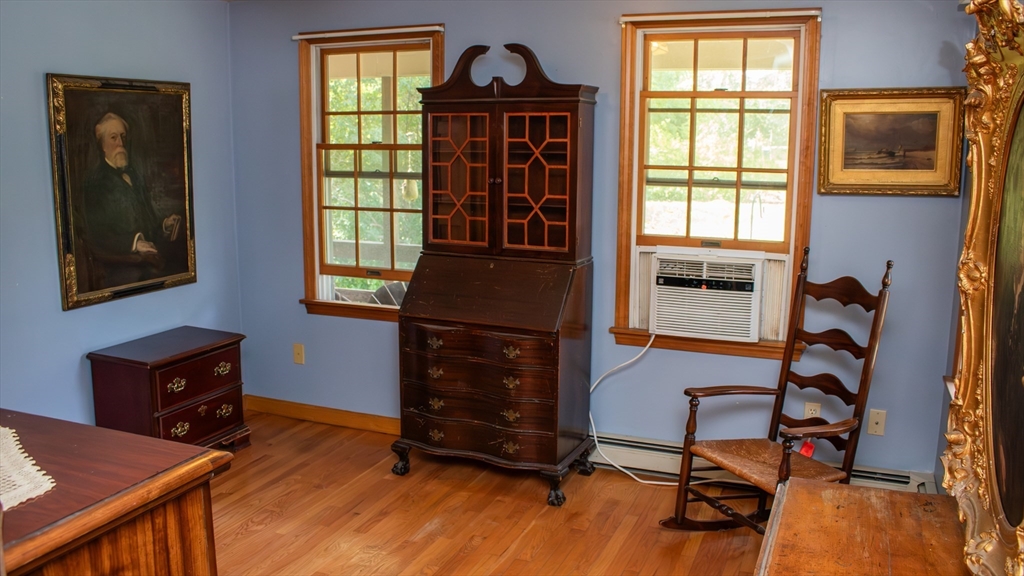 562 North Avenue Rochester, MA 02770 - Photo 23 of 32 a view of a workspace with furniture and a window