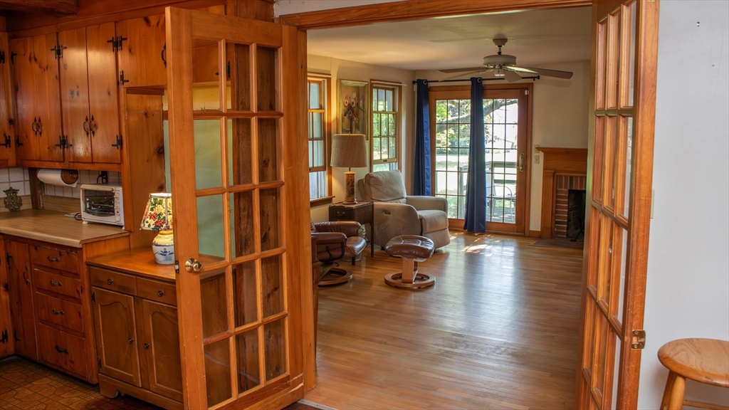 562 North Avenue Rochester, MA 02770 - Photo 10 of 32 a view of a livingroom with furniture and hardwood floor
