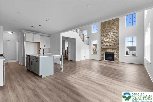 a view of kitchen with furniture and wooden floor