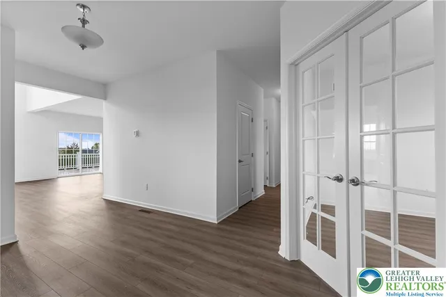 a view of a room with wooden floor and interior