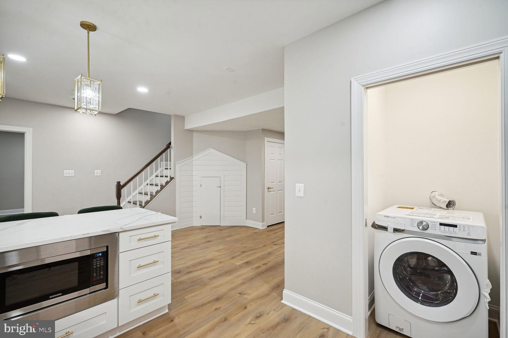 6390 Gayfields Road Alexandria, VA 22315 - Photo 15 of 15 a view of a hallway with washer and dryer