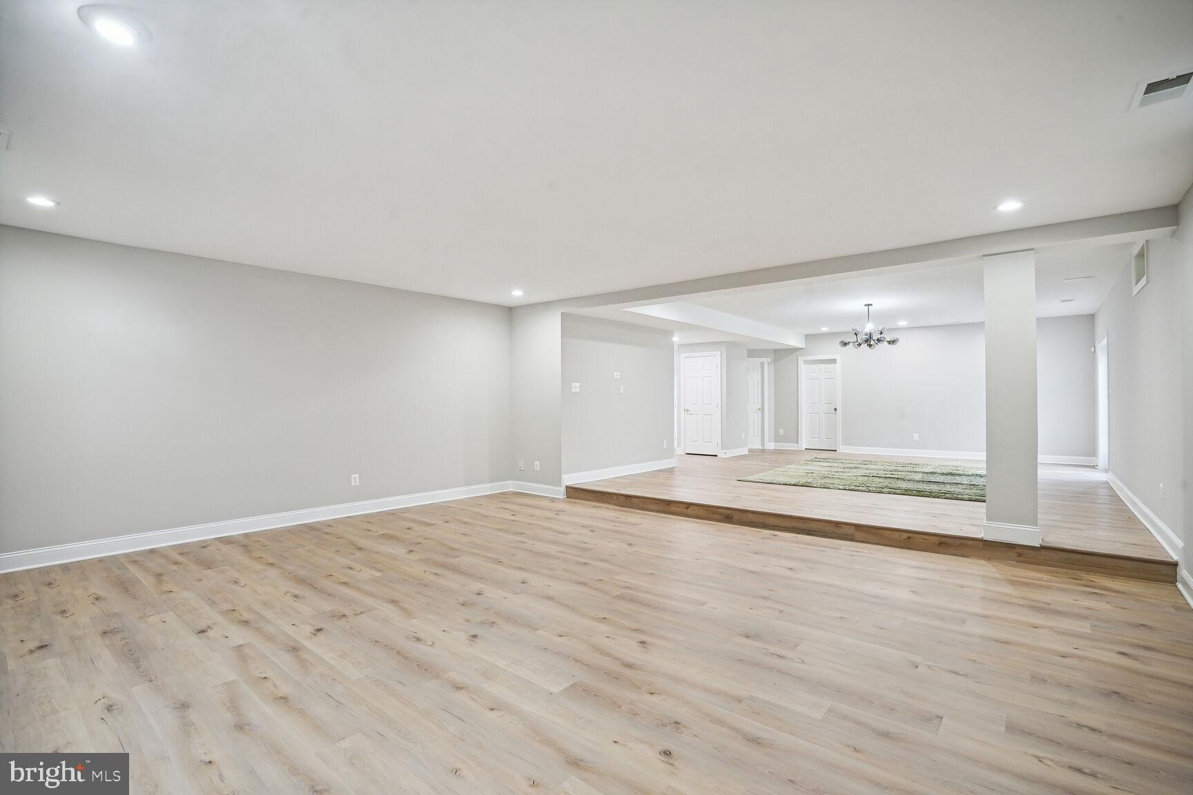 6390 Gayfields Road Alexandria, VA 22315 - Photo 6 of 15 a view of a livingroom with wooden floor