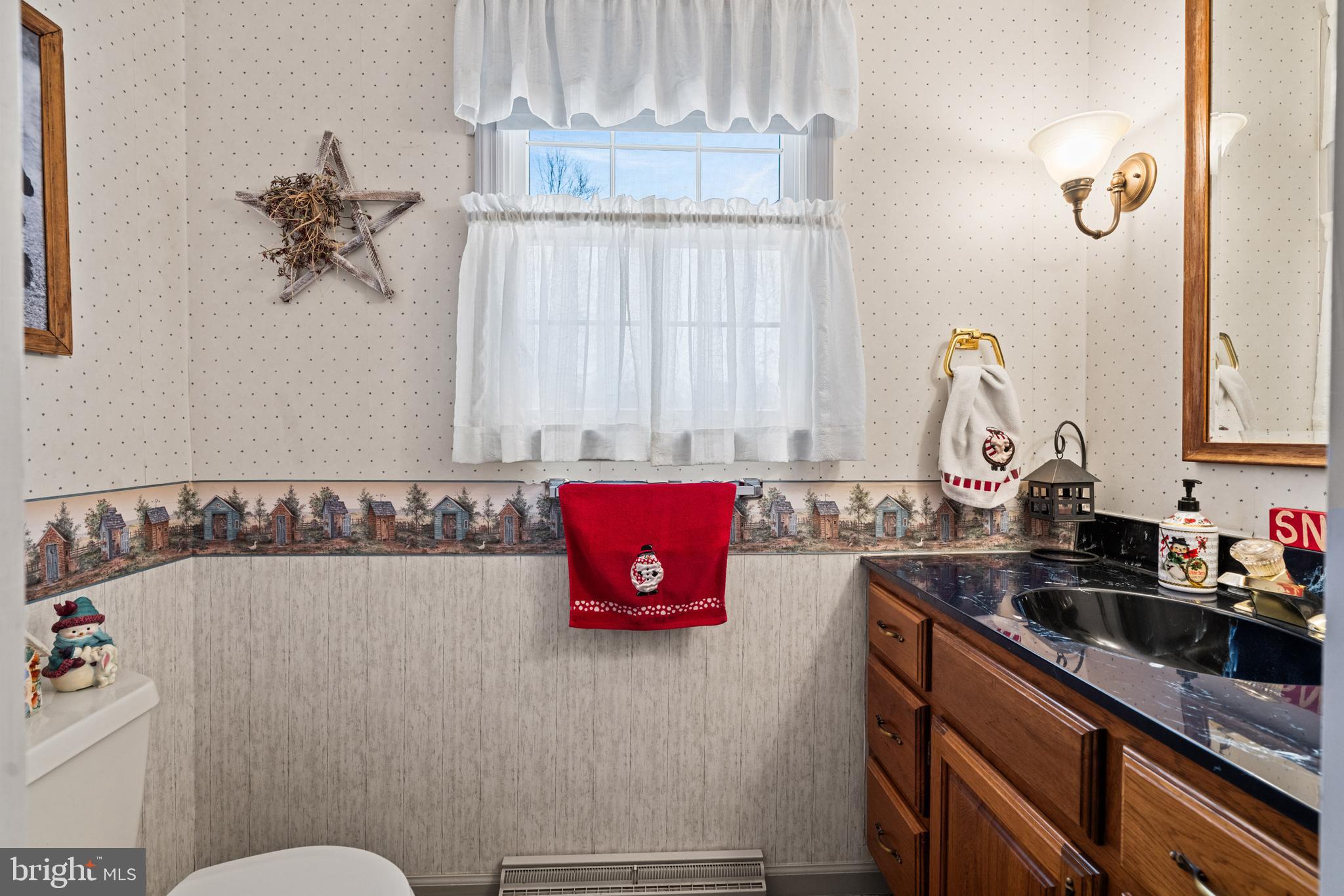 118 Middle Creek Road Gilbertsville, PA 19525 - Photo 26 of 108 a bathroom with a sink a vanity and a mirror