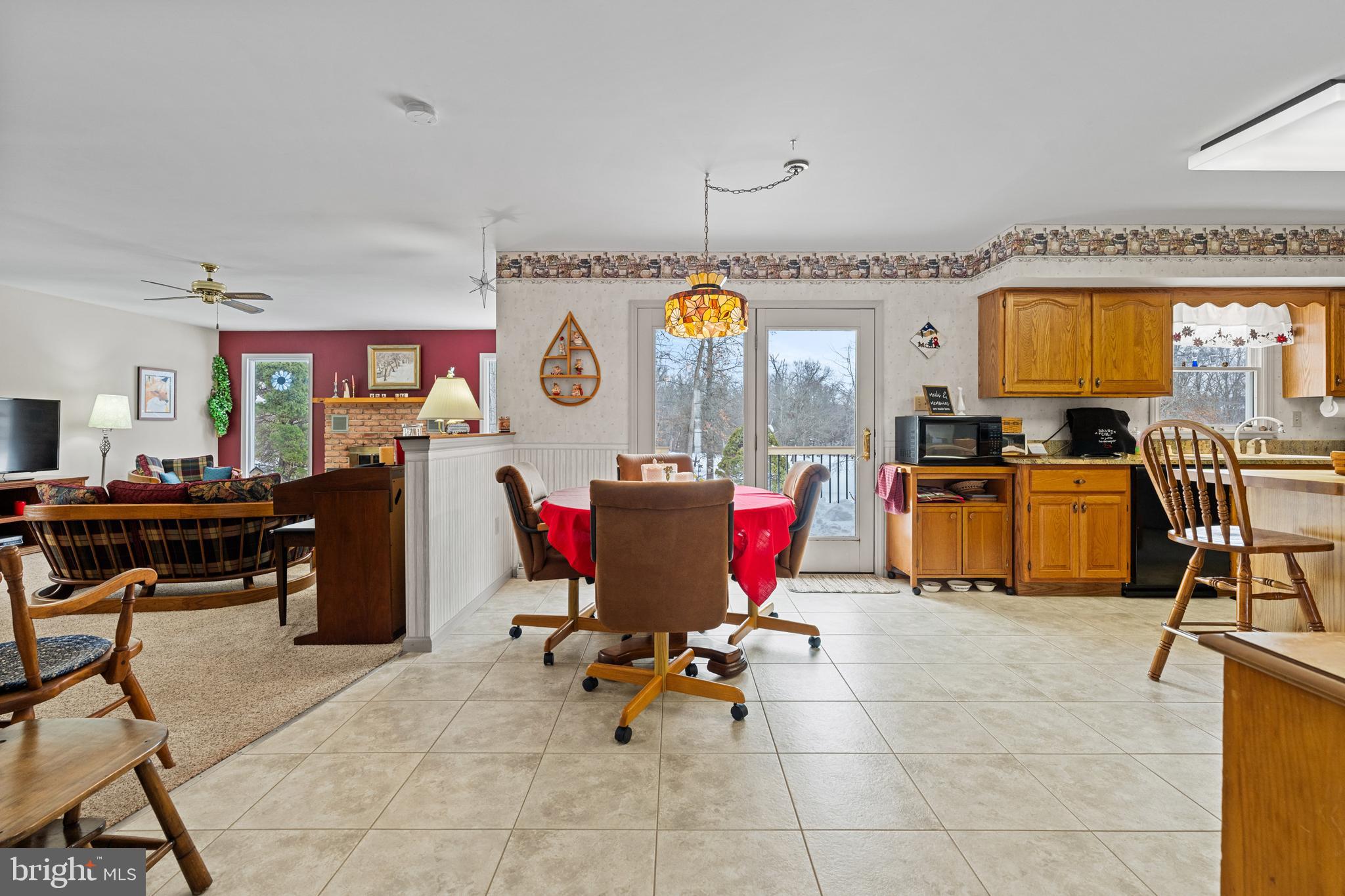 118 Middle Creek Road Gilbertsville, PA 19525 - Photo 29 of 108 a living room with furniture and a open kitchen view