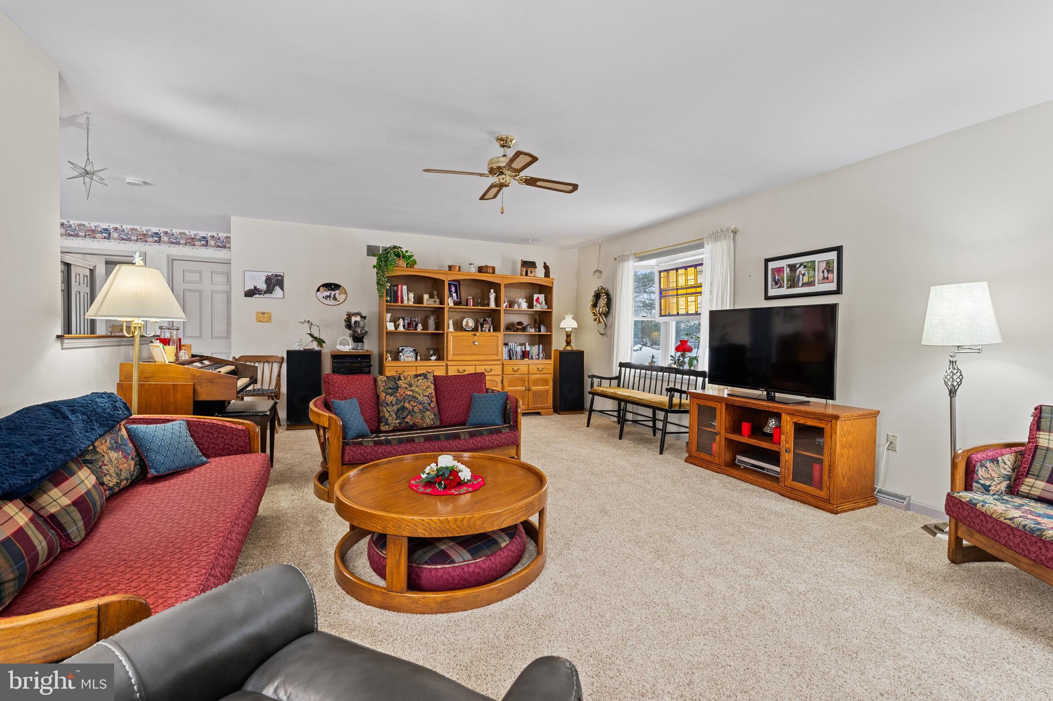 118 Middle Creek Road Gilbertsville, PA 19525 - Photo 33 of 108 a living room with furniture and a flat screen tv