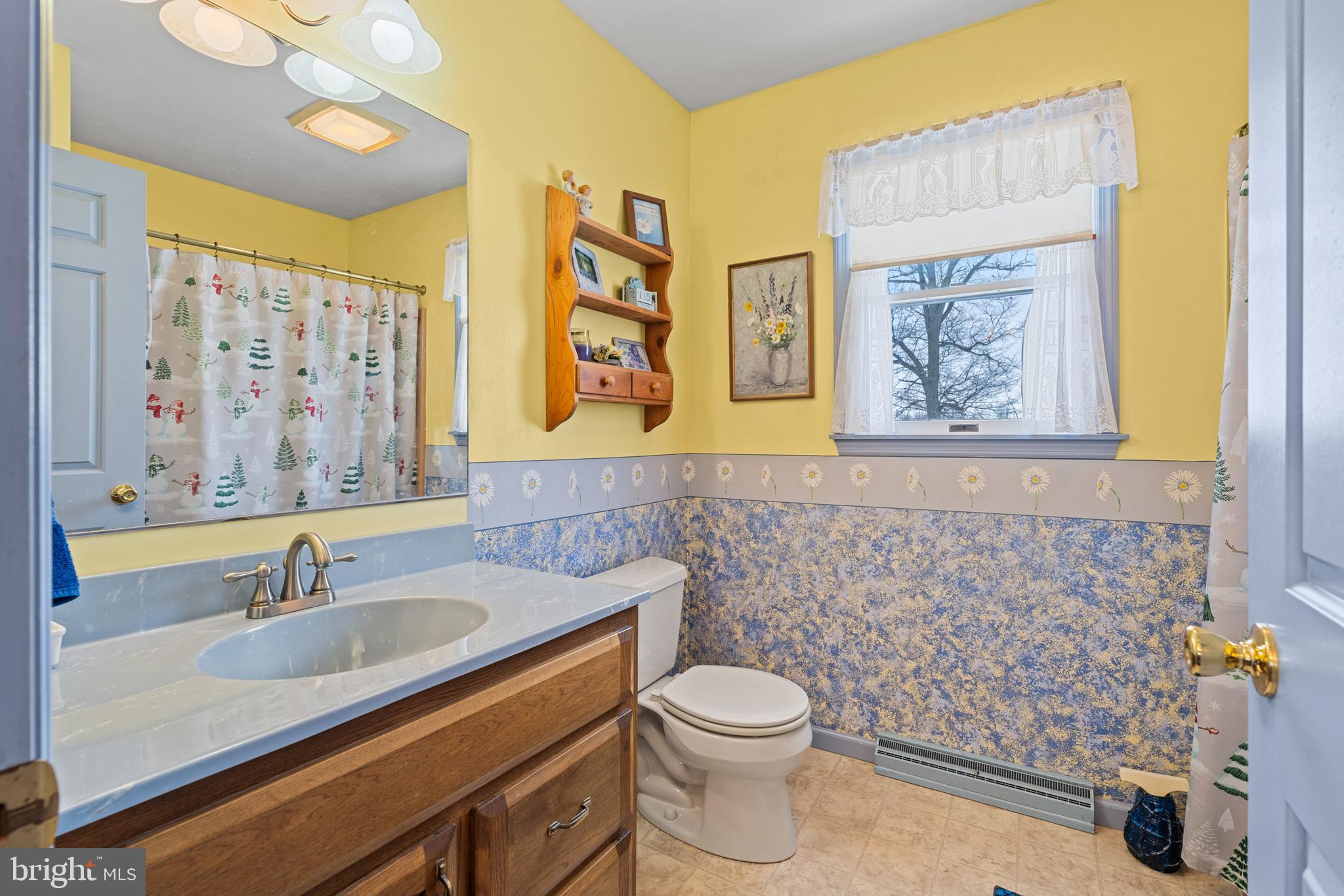 118 Middle Creek Road Gilbertsville, PA 19525 - Photo 42 of 108 a bathroom with a sink a toilet and shower