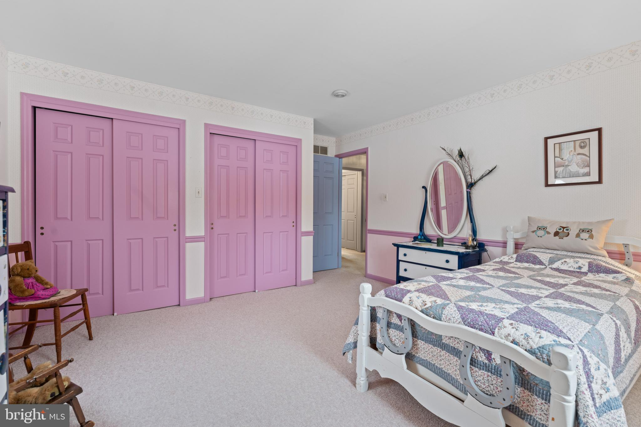 118 Middle Creek Road Gilbertsville, PA 19525 - Photo 56 of 108 a bedroom with a bed and a chandelier