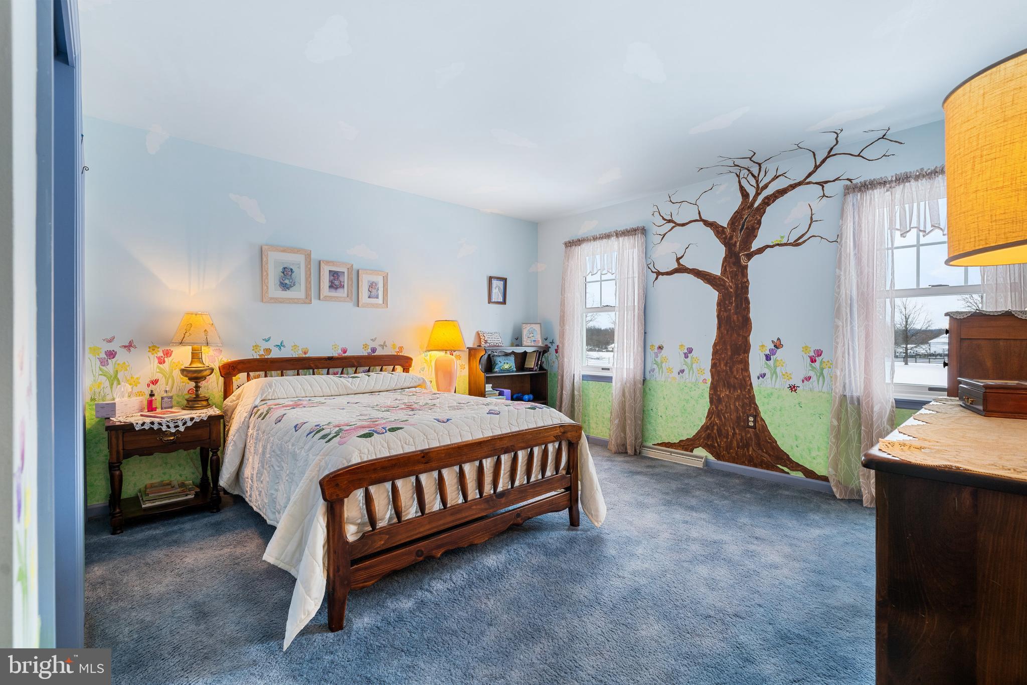 118 Middle Creek Road Gilbertsville, PA 19525 - Photo 58 of 108 a bedroom with a bed a table and potted plants