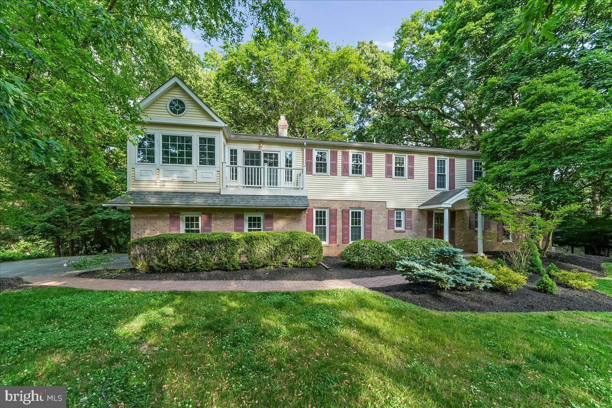 686 Limehouse Road Wayne, PA 19087 - Photo 1 of 51 a front view of a house with a yard