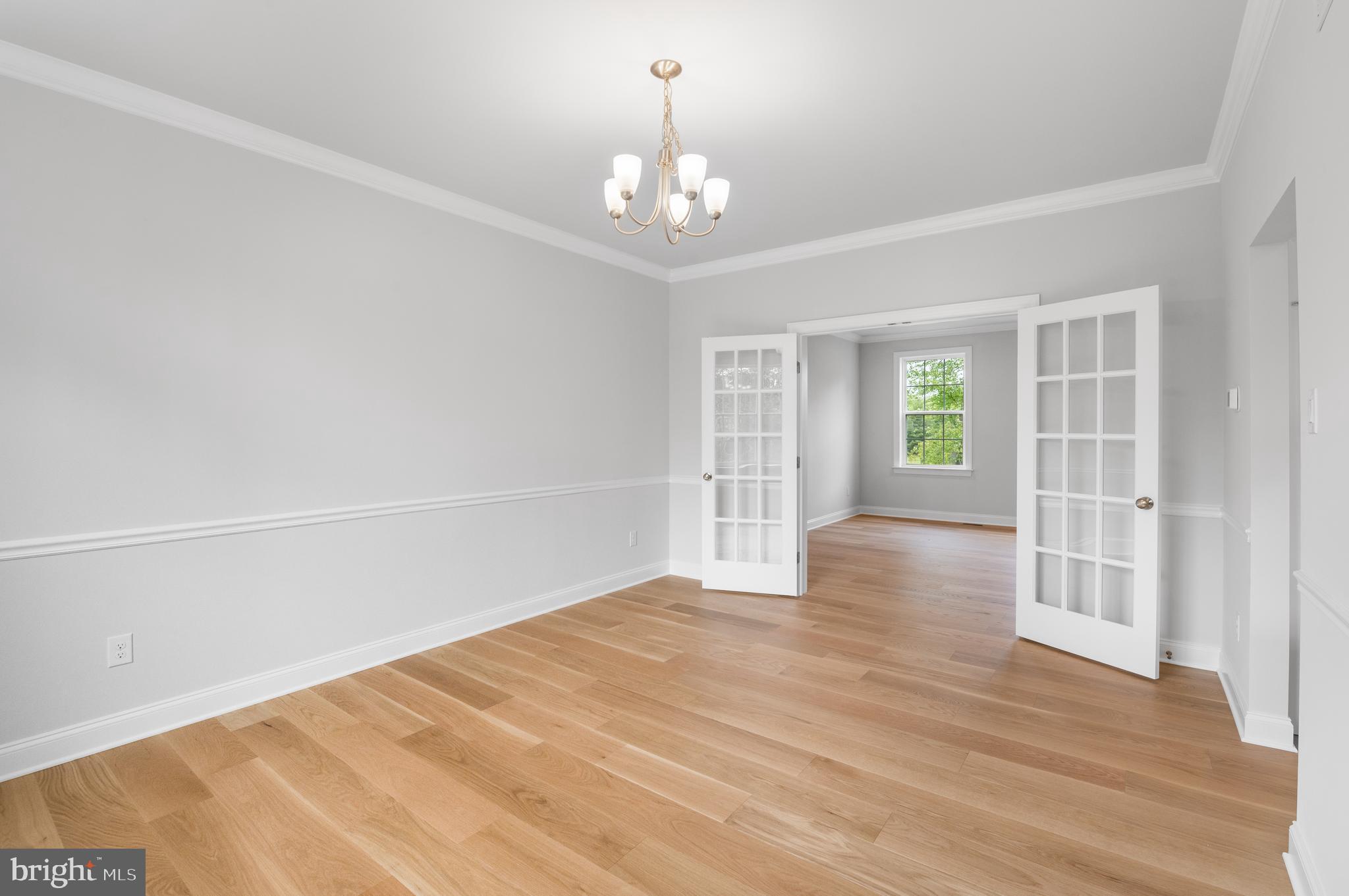 1108 Arden Drive, Unit METHACTON Norristown, PA 19403 - Photo 6 of 27 wooden floor in an empty room with a window