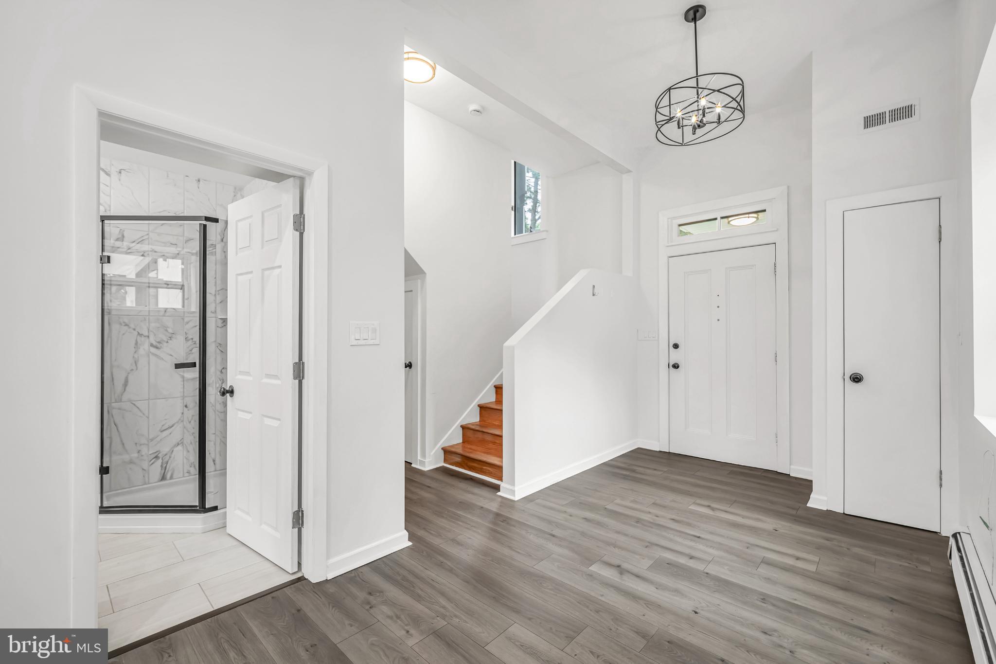 933 Fox Chase Road Jenkintown, PA 19046 - Photo 14 of 39 a view of entryway with wooden floor