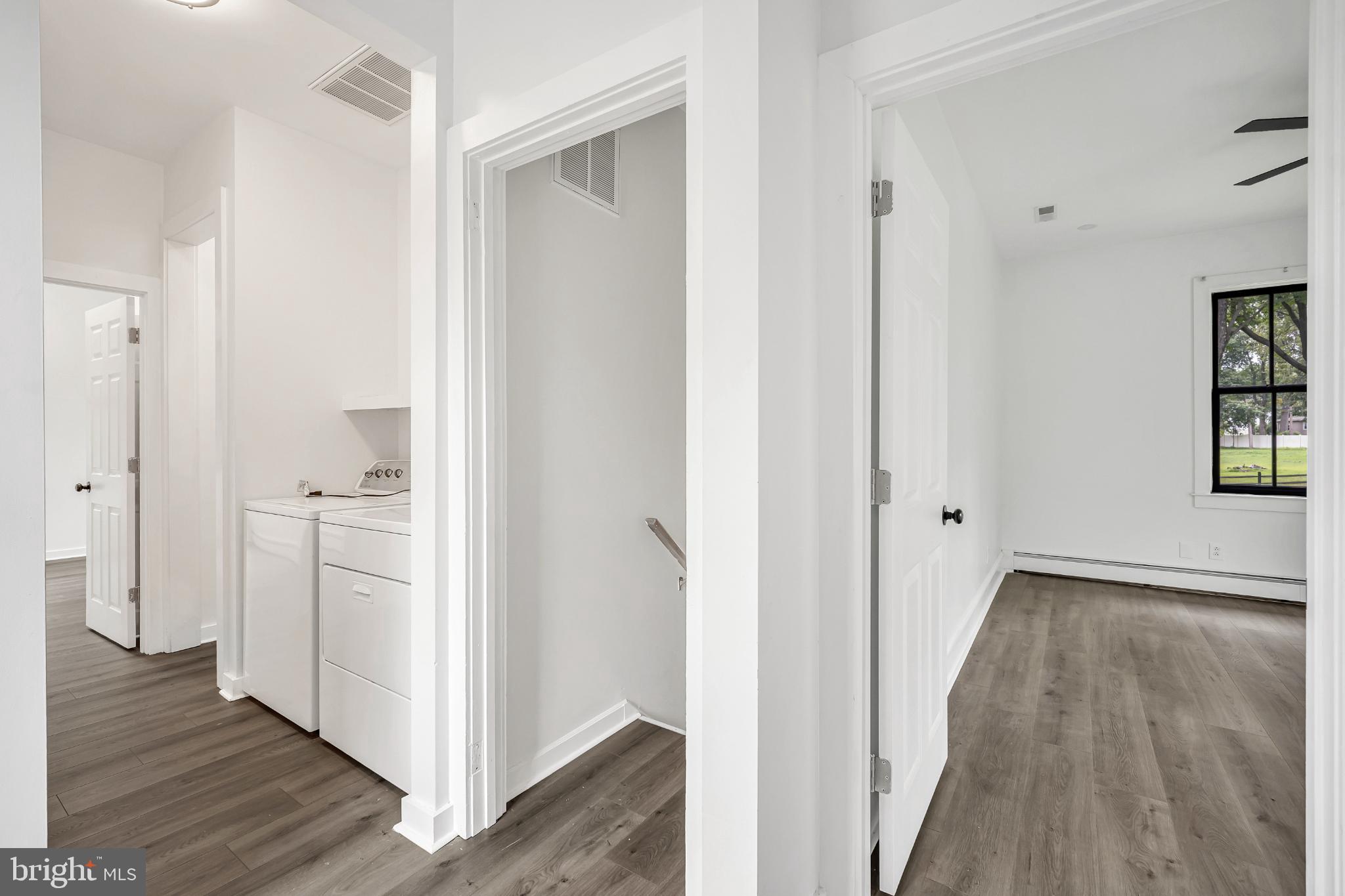 933 Fox Chase Road Jenkintown, PA 19046 - Photo 25 of 39 a view of a hallway with empty room and wooden floor