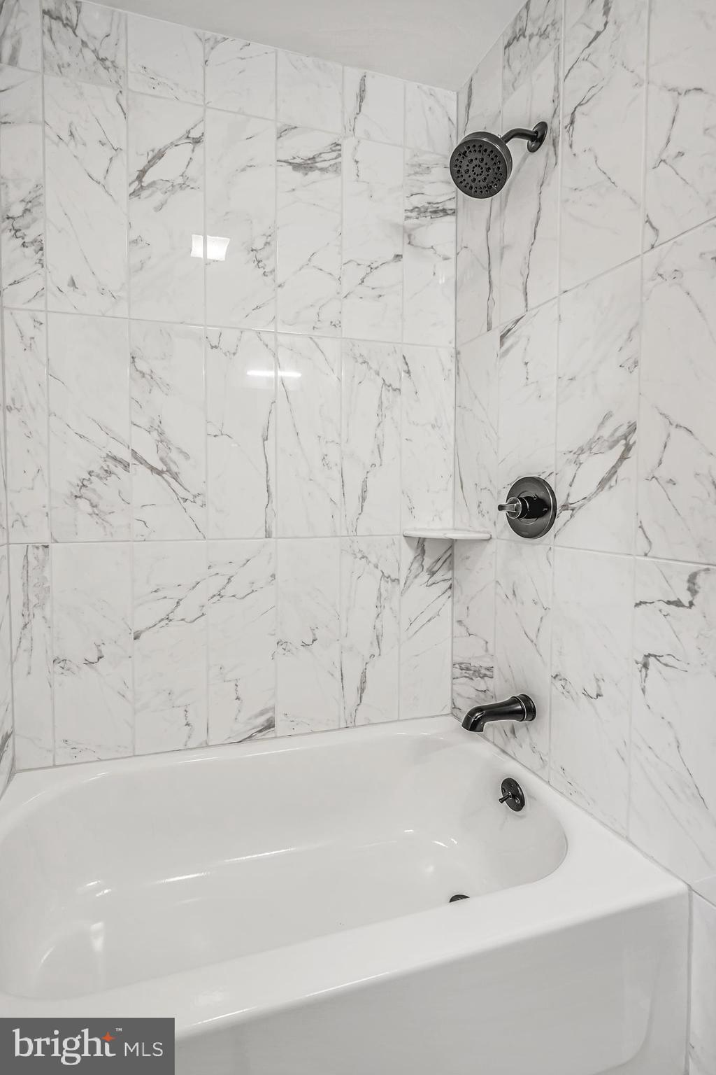 933 Fox Chase Road Jenkintown, PA 19046 - Photo 38 of 39 a bathroom with a bathtub