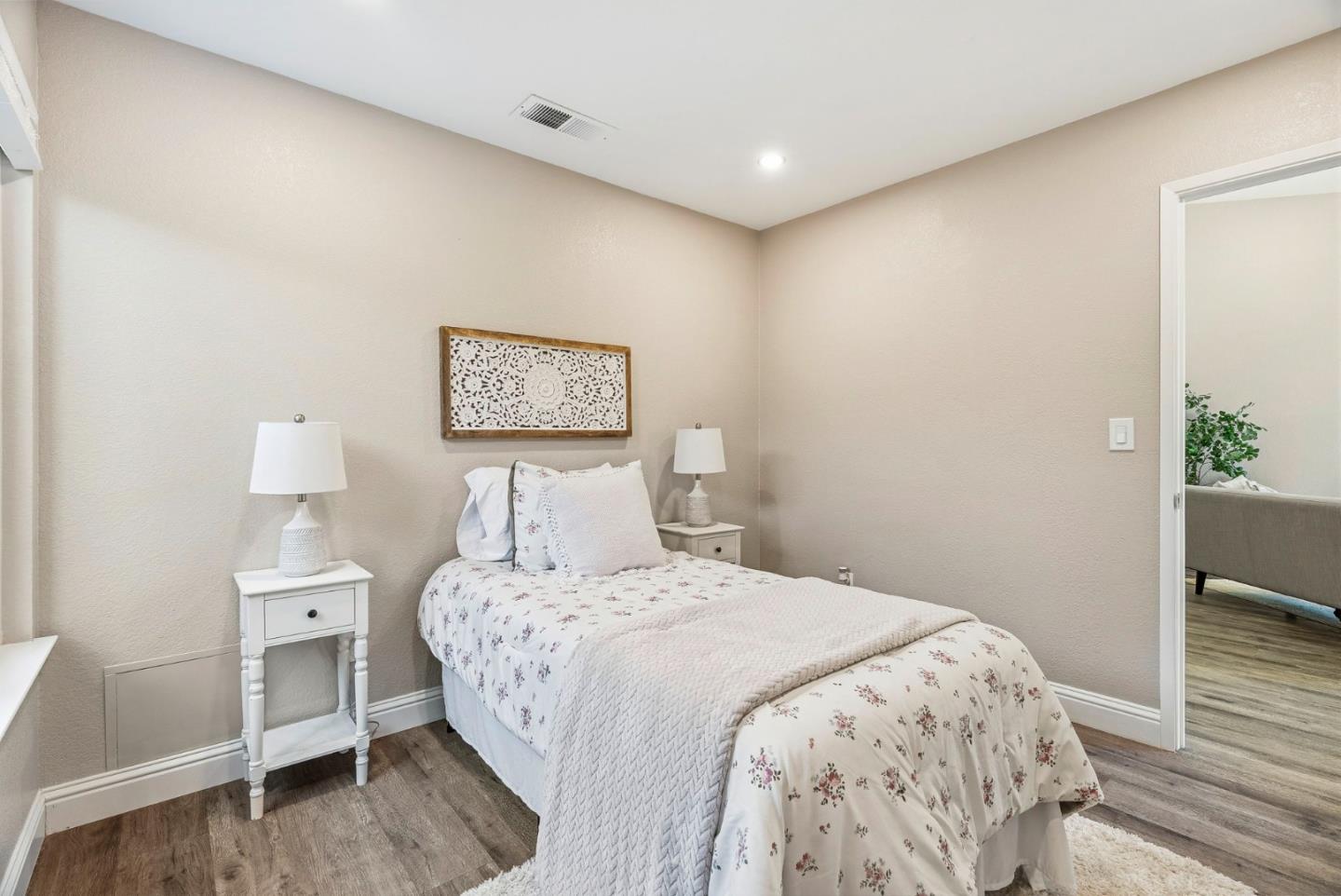 297 Perch Way Aptos, CA 95003 - Photo 18 of 42 a bedroom with a bed and a view of bathroom