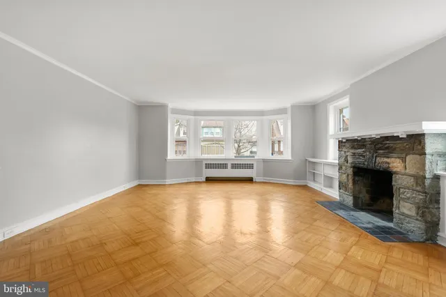 a view of an empty room and window