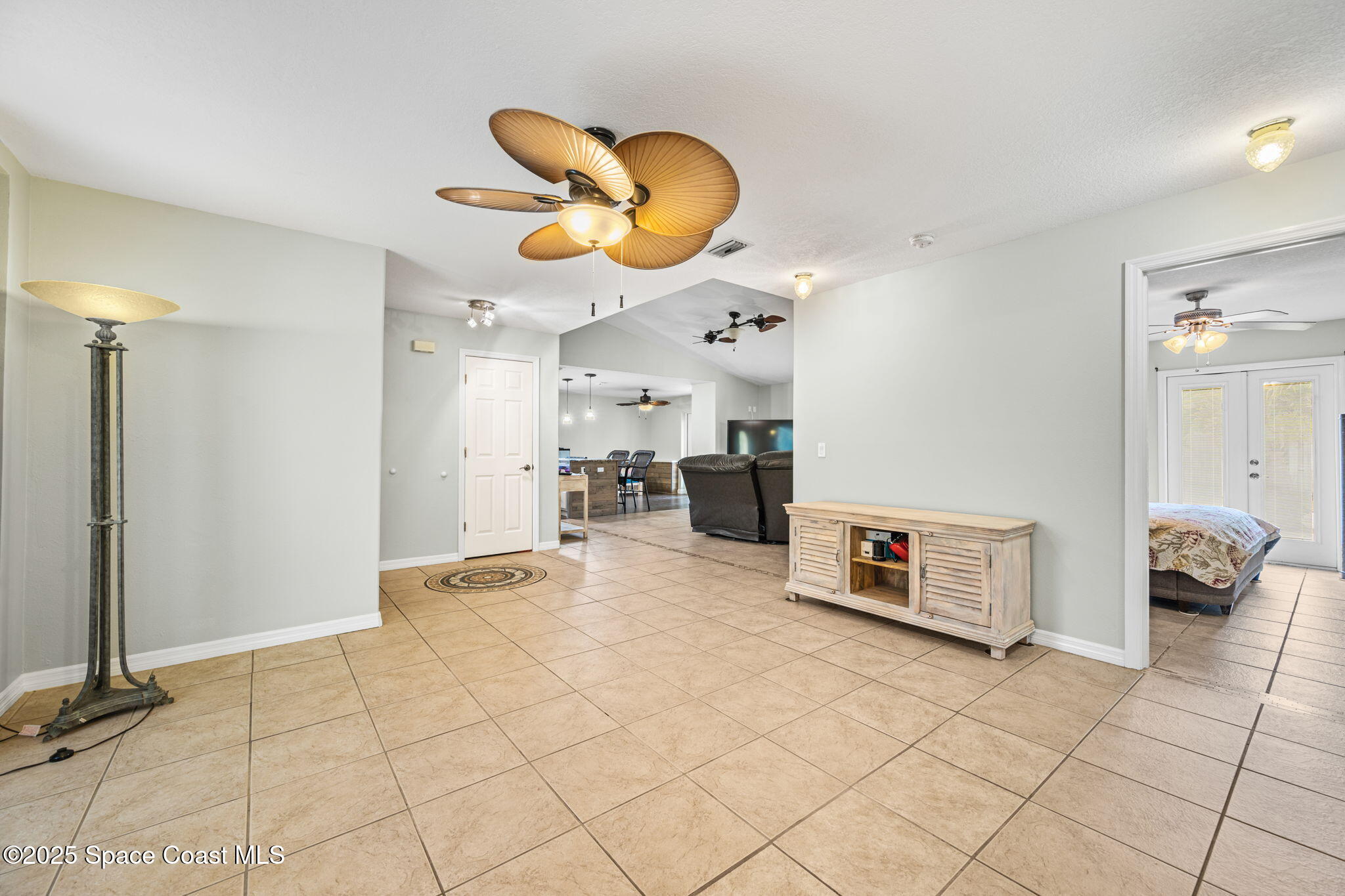2568 Longwood Boulevard Melbourne, FL 32934 - Photo 22 of 42 a view of living room with furniture and a window