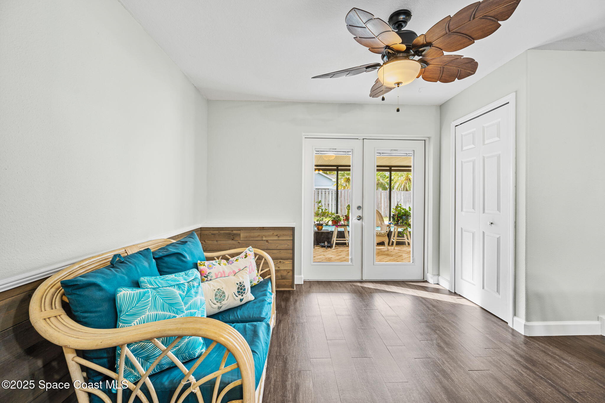 2568 Longwood Boulevard Melbourne, FL 32934 - Photo 32 of 42 a view of a dining room with furniture and wooden floor