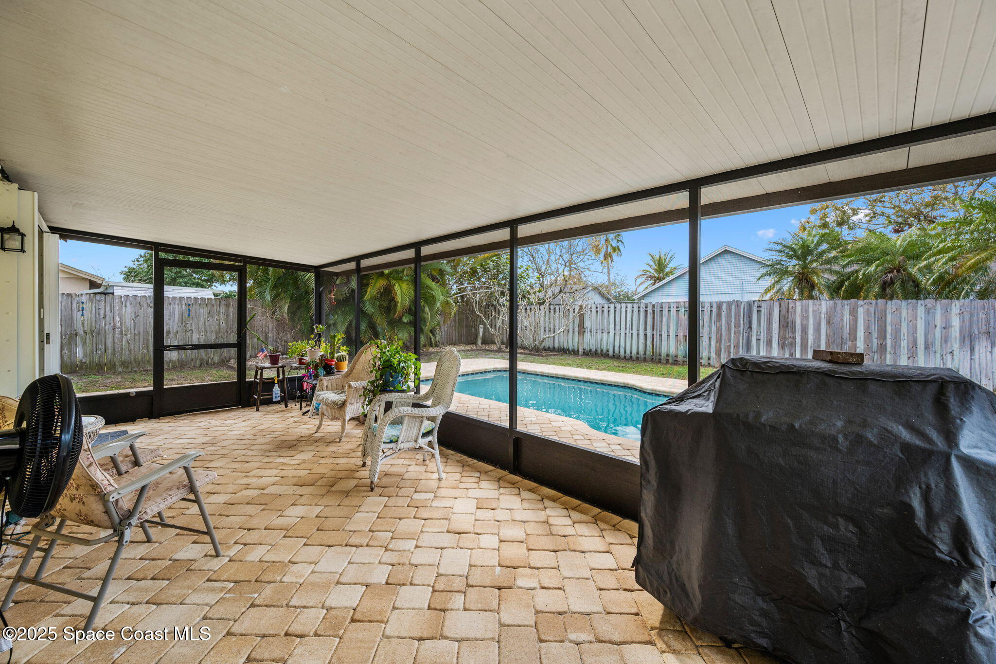 2568 Longwood Boulevard Melbourne, FL 32934 - Photo 34 of 42 a view of a porch with chairs and backyard